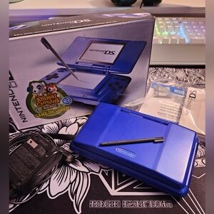 Blue Nintendo DS with Stylus, Charger, and Original Box (no games)